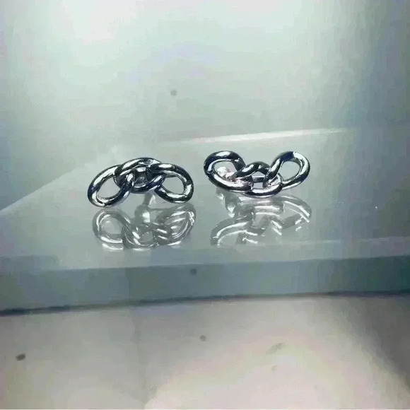 Coro Jewelry - Stamped  Coro Chainlink silver tone screwback earrings.